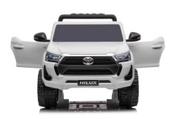 Toyota Hilux na akumulator dla dzieci Biały Pickup + Napęd 4x4 + Pilot + 2 bagażniki