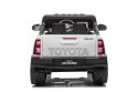 Toyota Hilux na akumulator dla dzieci Biały Pickup + Napęd 4x4 + Pilot + 2 bagażniki